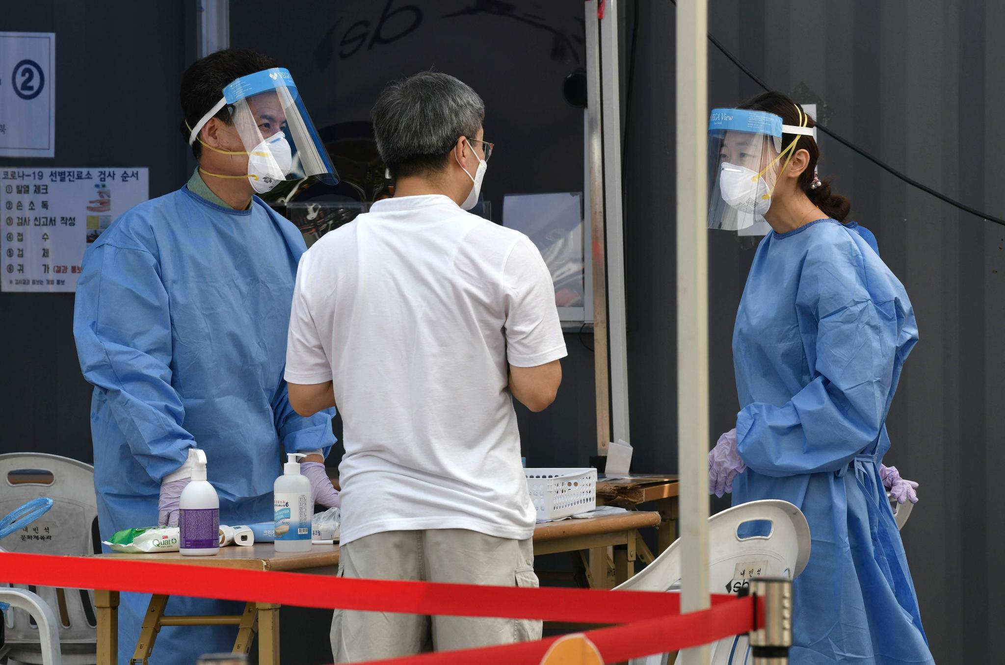 韩国现双重感染病例〃韩国确诊病例突破7千-第2张图片